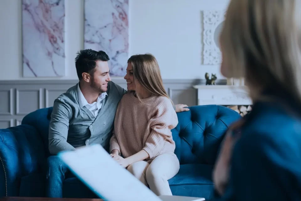 Couples receiving counselling in the office