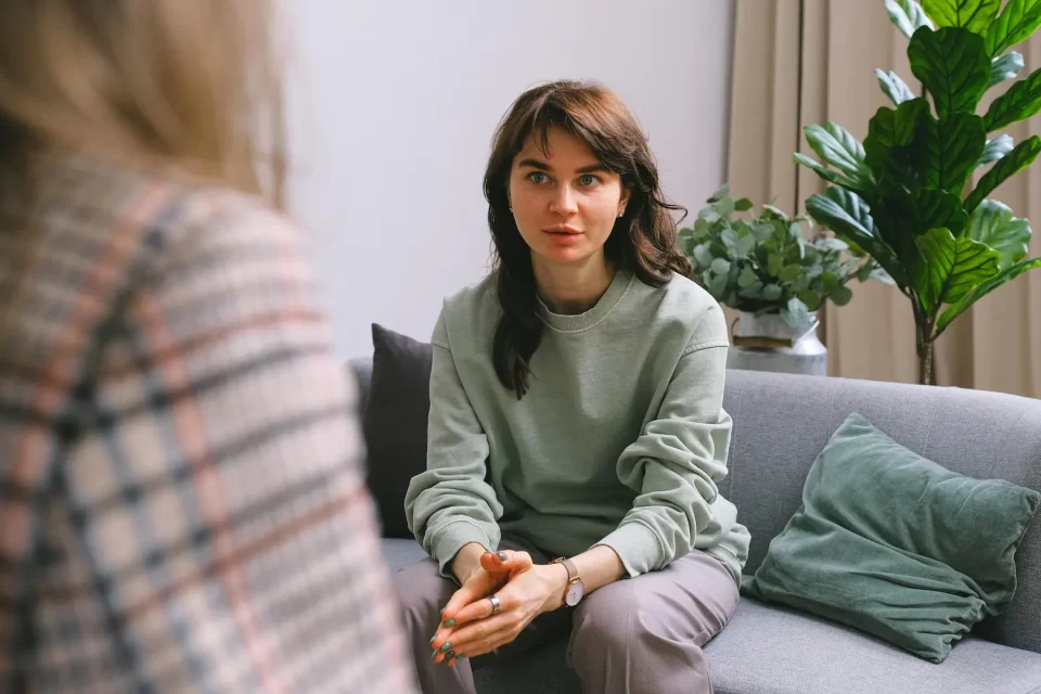 Woman in office receiving Counselling